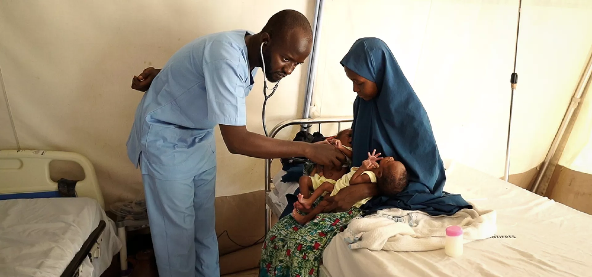 Nurse Examines Patient